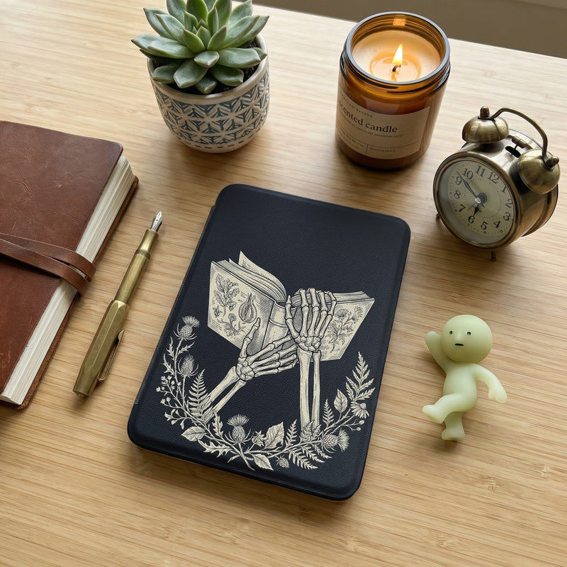 Skeleton Hands Holding Book Kindle Case — Gothic Book Lover Gift
